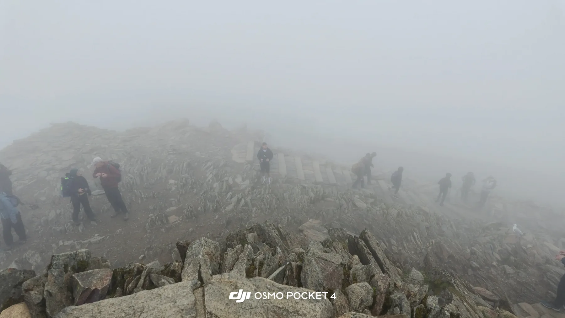 Wind, rain and thick mist on the rocky path.