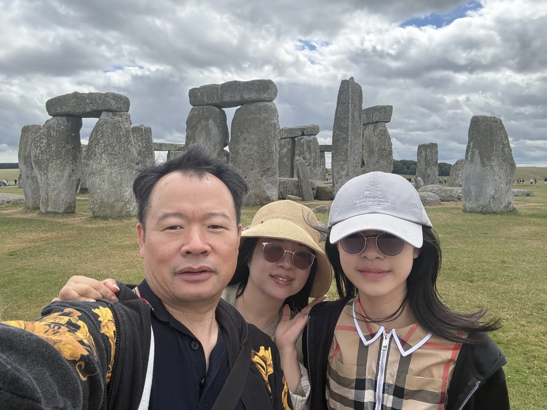 A windy family photo with the stones behind us.